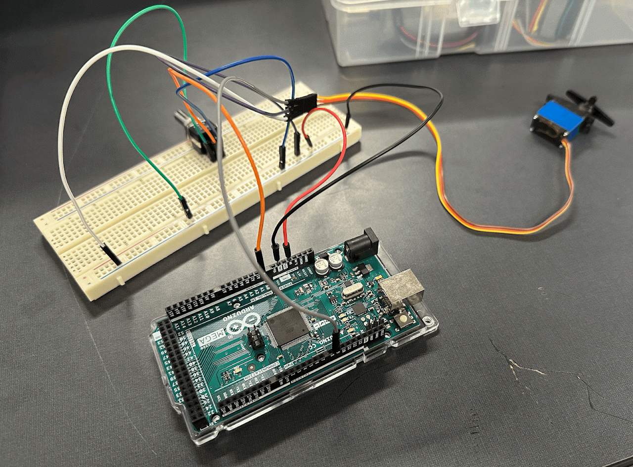 Arduino Mega and servo prototype wiring on a lab bench