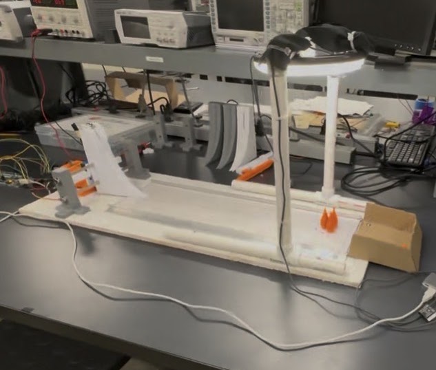 Final rack-and-pinion bowling robot with a camera, ramp and containment rails